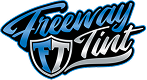 Logo for Freeway Tint, featuring bold blue and silver script with a shield emblem containing the initials "FT".